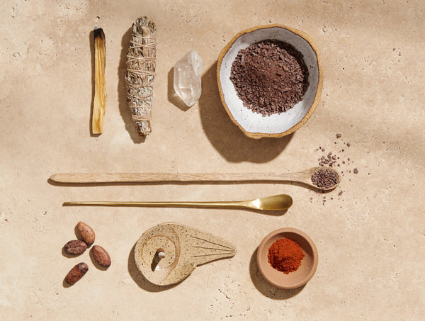 cacao ceremony equipment with chili powder crystals and sage